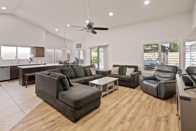 21335 N 64th Ave, Glendale, AZ 85308 - living area with high vaulted ceiling, recessed lighting, light wood-type flooring, and ceiling fan
