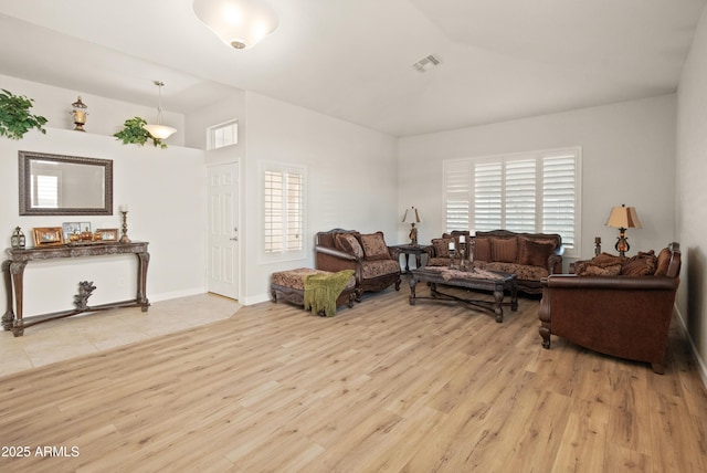 21335 N 64th Ave, Glendale, AZ 85308 - living area with visible vents, baseboards, and wood finished floors