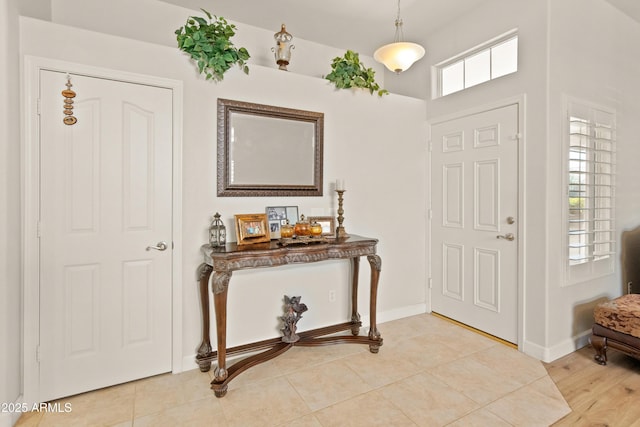 21335 N 64th Ave, Glendale, AZ 85308 - entryway with light tile patterned floors and baseboards