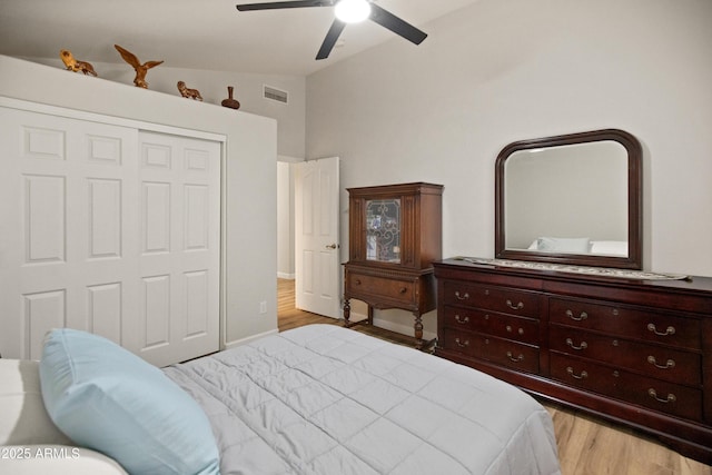 21335 N 64th Ave, Glendale, AZ 85308 - bedroom with visible vents, a closet, ceiling fan, light wood-type flooring, and vaulted ceiling