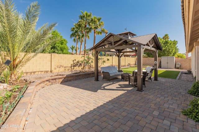 21335 N 64th Ave, Glendale, AZ 85308 - view of patio featuring a gazebo, a shed, a fenced backyard, and an outdoor structure