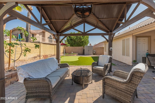 21335 N 64th Ave, Glendale, AZ 85308 - view of patio featuring a fenced backyard, a gazebo, and an outdoor hangout area