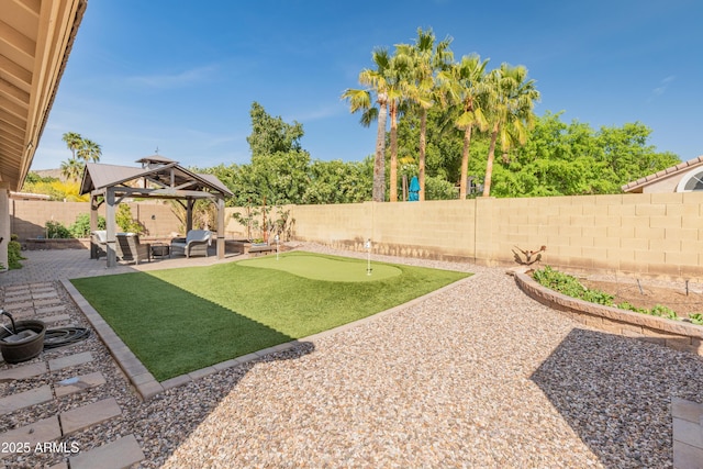 21335 N 64th Ave, Glendale, AZ 85308 - view of yard with a fenced backyard, a gazebo, and a patio