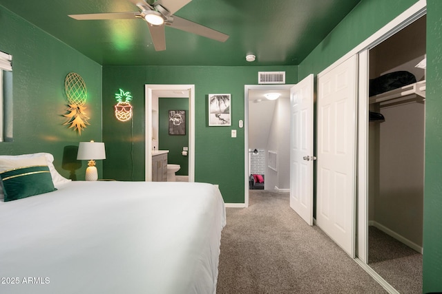 carpeted bedroom with ceiling fan, a closet, and connected bathroom