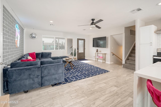 living room featuring ceiling fan