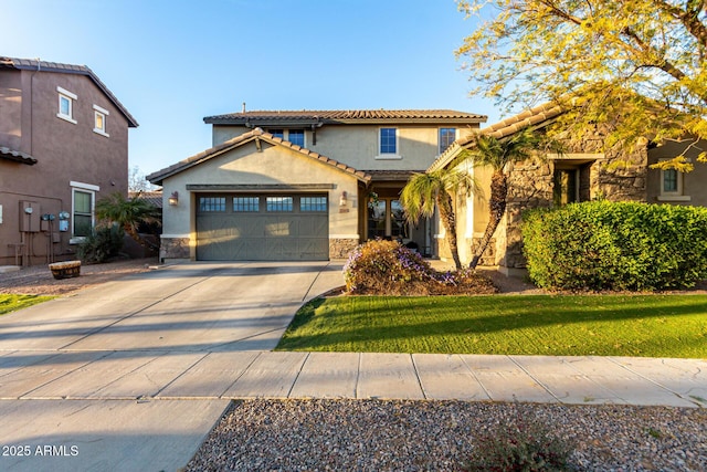 view of front facade with a garage and a front lawn