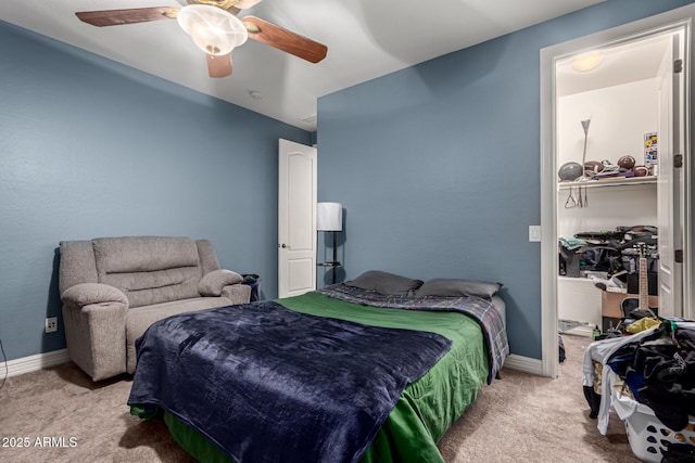 bedroom with light colored carpet and ceiling fan