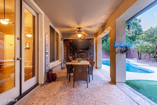 view of patio with ceiling fan