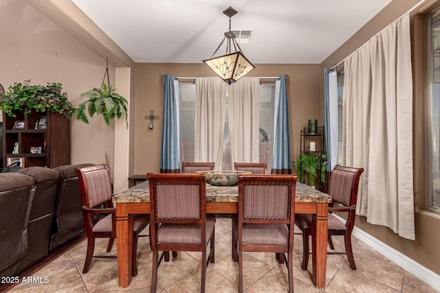 view of tiled dining area