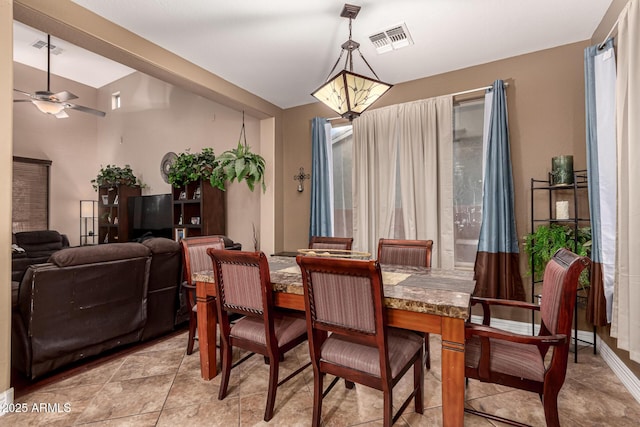 dining area with ceiling fan