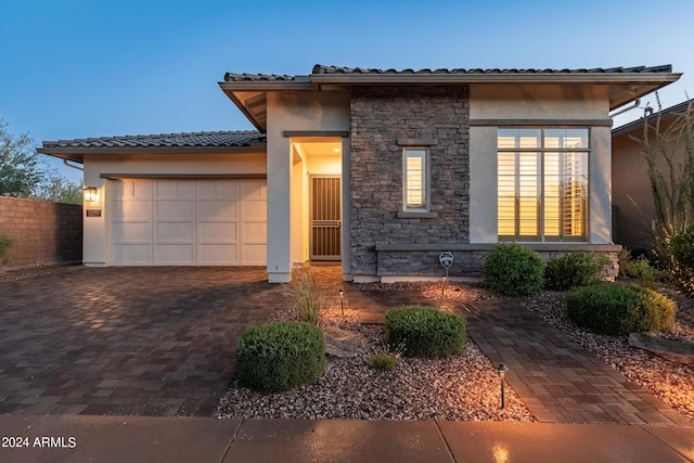 view of front of home with a garage