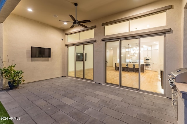 view of patio with ceiling fan