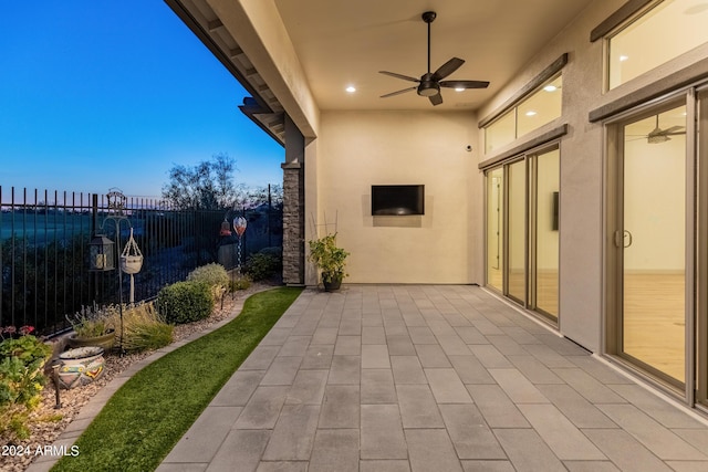 view of patio / terrace with ceiling fan