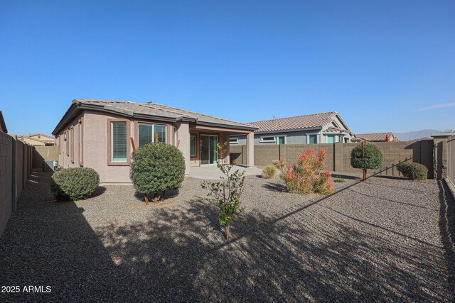 rear view of property with a patio