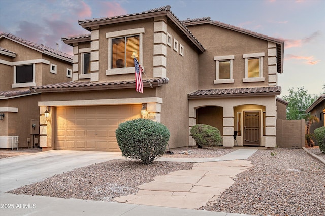 view of front of property featuring a garage