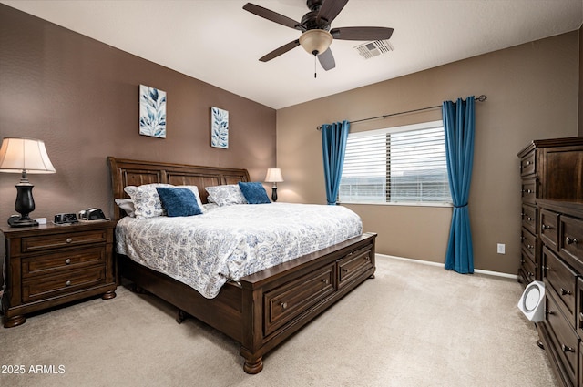 bedroom featuring ceiling fan and light colored carpet