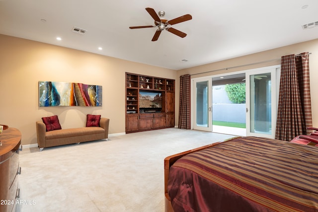 carpeted bedroom featuring ceiling fan and access to outside