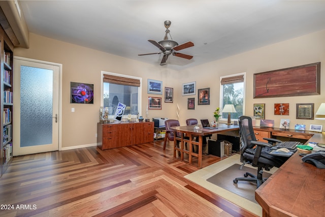 office area featuring parquet floors and ceiling fan