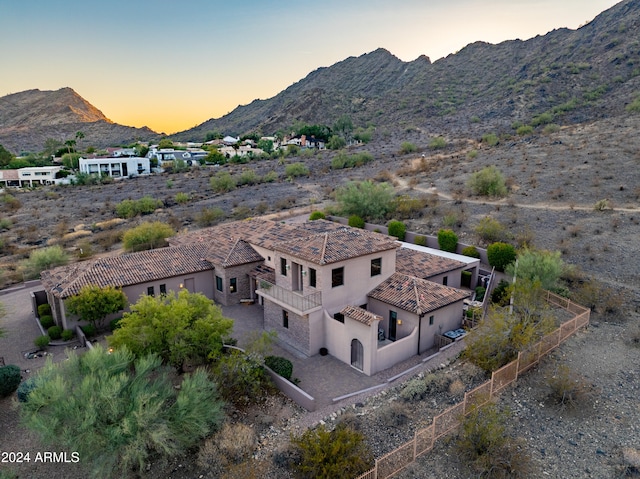 aerial view at dusk with a mountain view