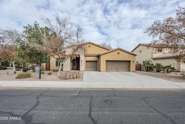 mediterranean / spanish-style house featuring a garage