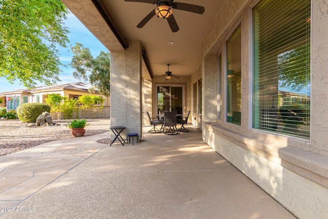 view of patio featuring ceiling fan