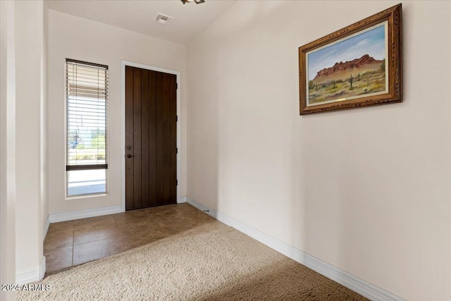 entryway featuring carpet