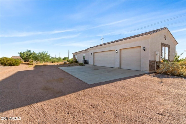 garage featuring cooling unit