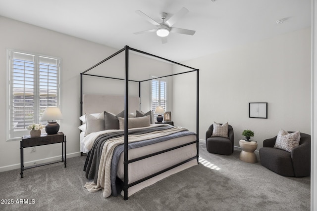 carpeted bedroom with baseboards and a ceiling fan