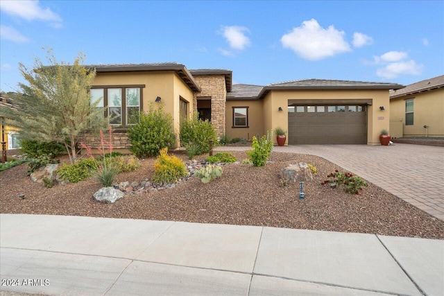 prairie-style home with a garage