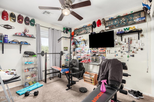 exercise area with carpet, baseboards, visible vents, and a ceiling fan