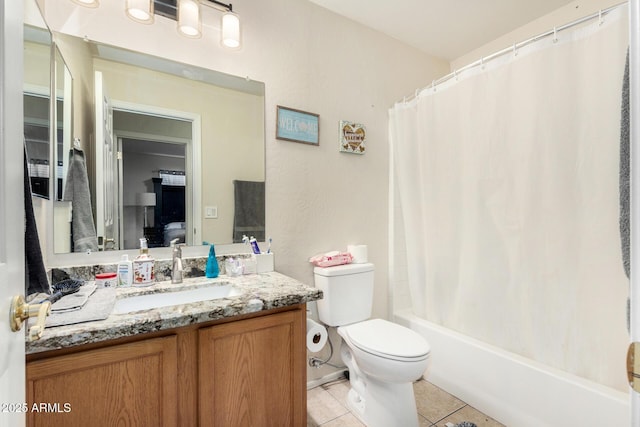 full bath featuring shower / bath combo, vanity, toilet, and tile patterned floors