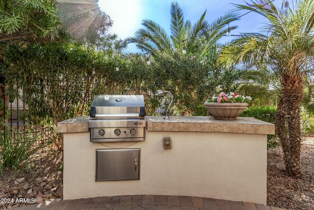 view of patio with area for grilling