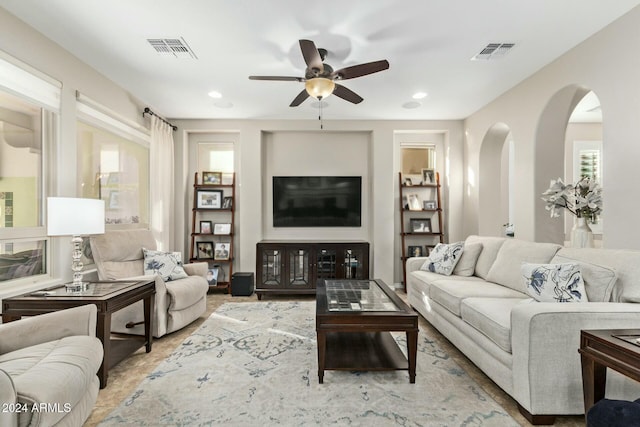 living room featuring ceiling fan