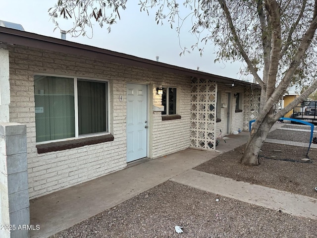 view of front of property with brick siding