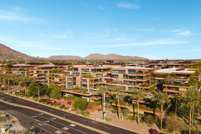 view of building exterior featuring a mountain view