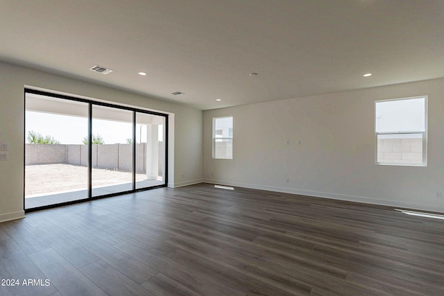 empty room featuring dark hardwood / wood-style floors