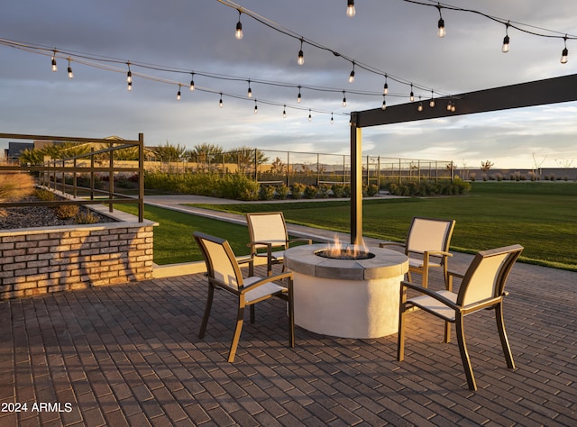 view of patio featuring a fire pit