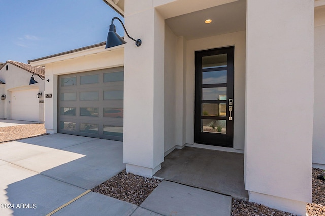 entrance to property with a garage