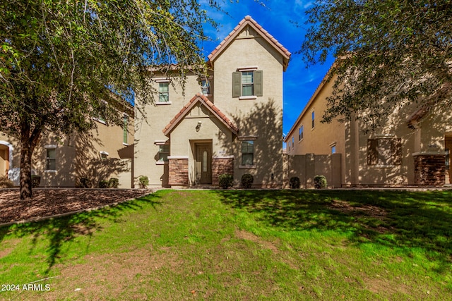 view of front facade with a front lawn