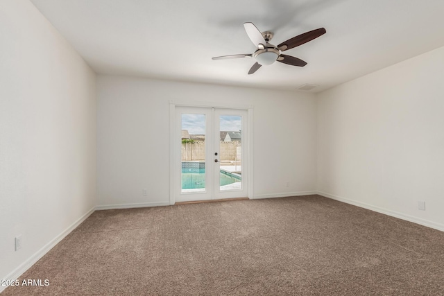 2210 W Tonto Ln, Phoenix, AZ 85027 - carpeted empty room with french doors, ceiling fan, and baseboards