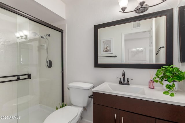 2210 W Tonto Ln, Phoenix, AZ 85027 - bathroom with toilet, vanity, and a stall shower