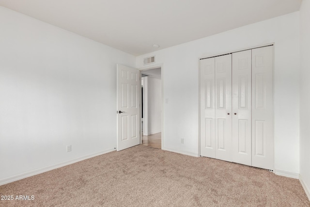 2210 W Tonto Ln, Phoenix, AZ 85027 - unfurnished bedroom featuring carpet, baseboards, and a closet