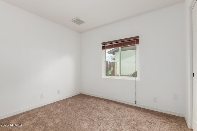 2210 W Tonto Ln, Phoenix, AZ 85027 - spare room with light carpet and baseboards