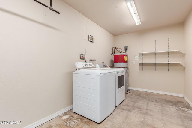 2210 W Tonto Ln, Phoenix, AZ 85027 - washroom featuring washer and clothes dryer, baseboards, and water heater