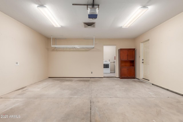 2210 W Tonto Ln, Phoenix, AZ 85027 - garage with washer / dryer and a garage door opener