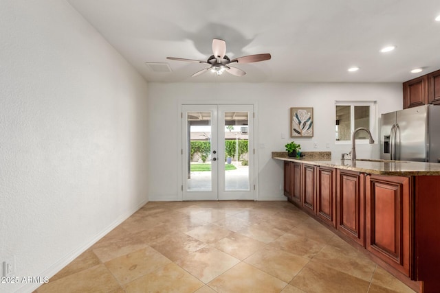2210 W Tonto Ln, Phoenix, AZ 85027 - kitchen with stainless steel refrigerator with ice dispenser, french doors, a ceiling fan, baseboards, and a sink
