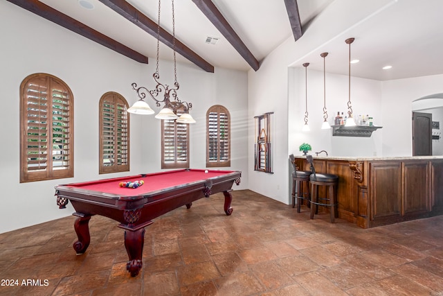 playroom with beamed ceiling, bar area, and billiards