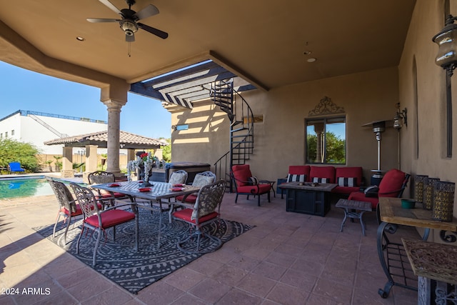 view of patio featuring outdoor lounge area and ceiling fan