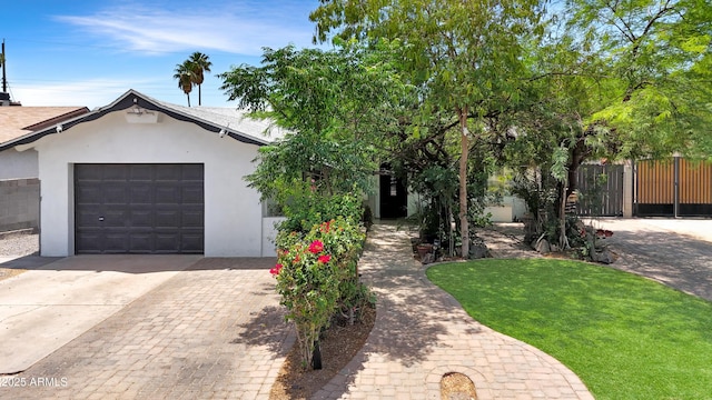 4639 W Keim Dr, Glendale, AZ 85301 - view of front facade with driveway, a garage, and stucco siding