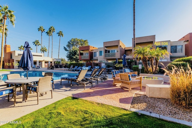 view of swimming pool featuring a patio area